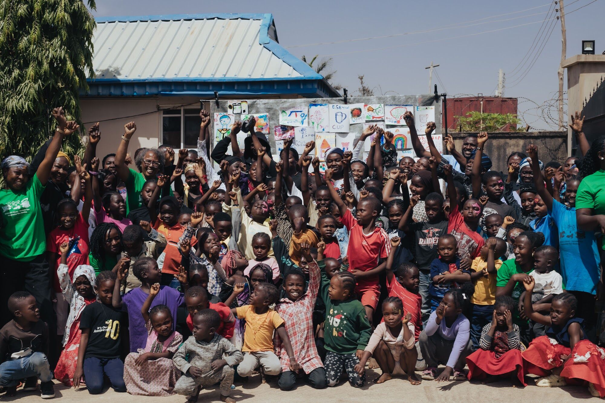Children cheering at the International Day of Education celebration