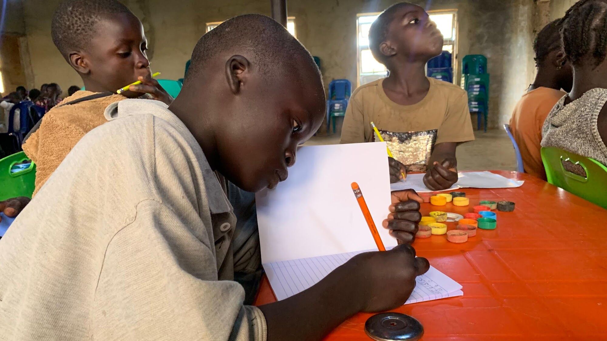 A learner writing in class